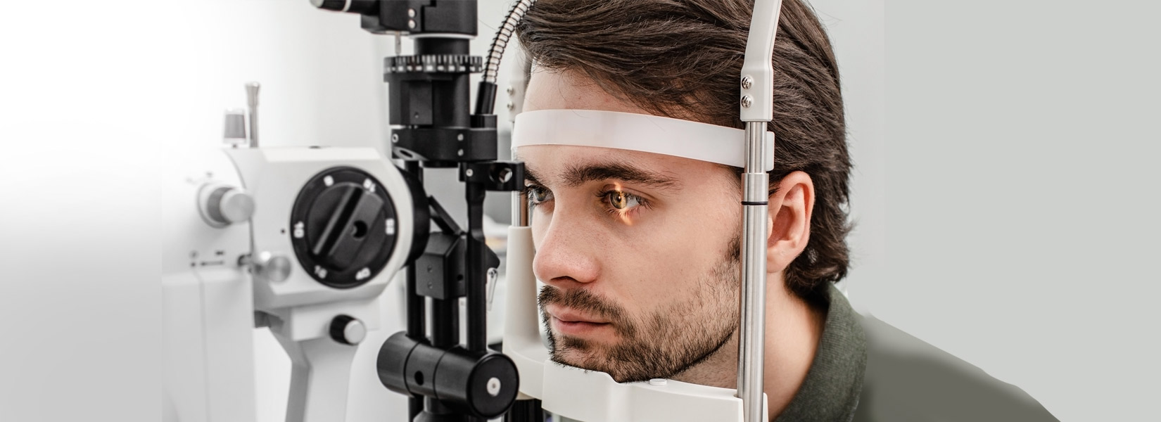 young man during eye exam in Westside